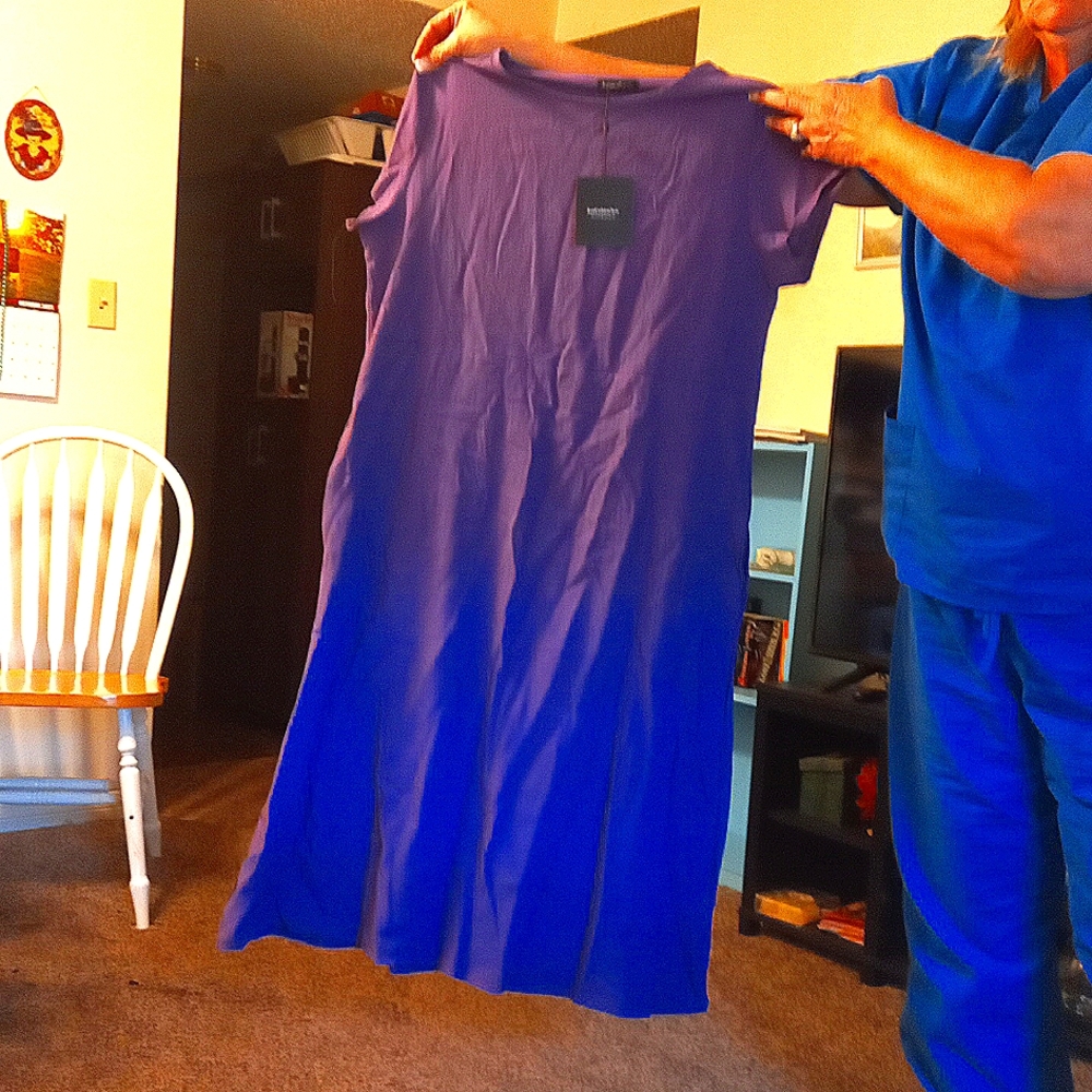 This is a purple dress size unknown it is from China believed to be a 1X